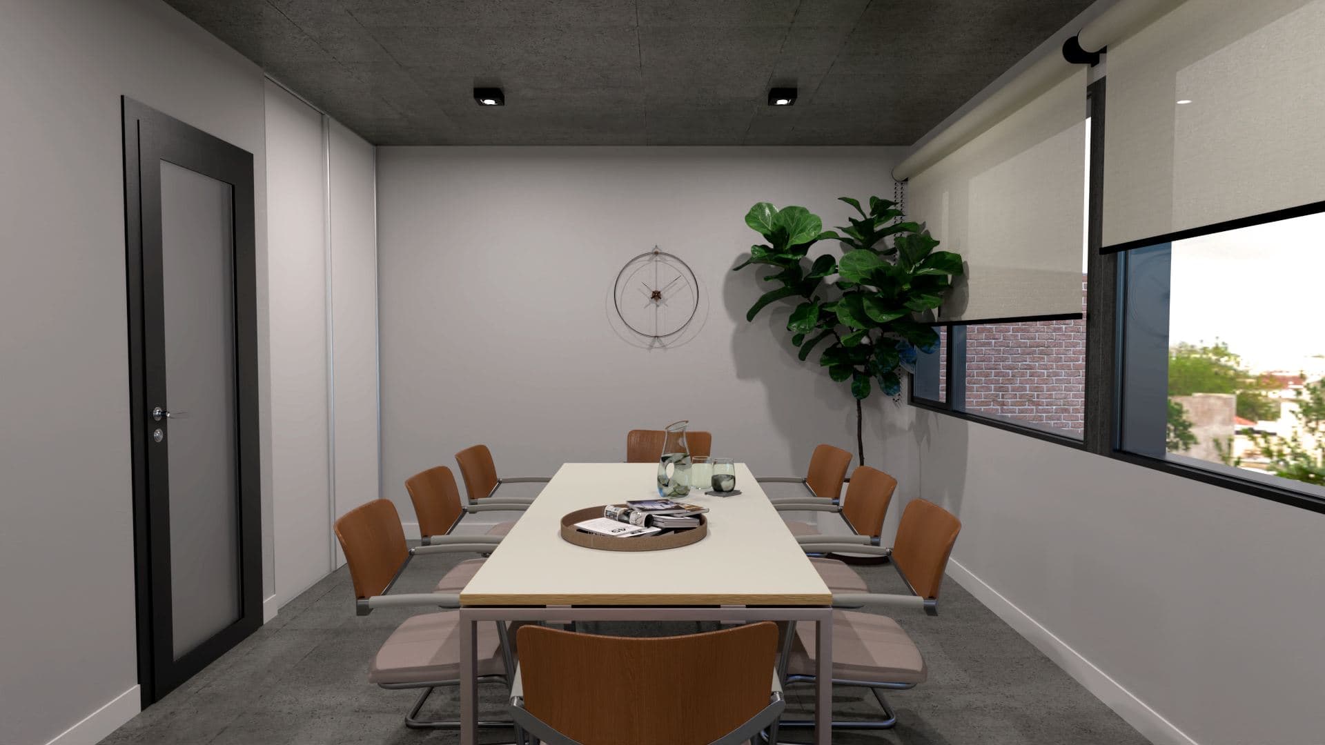 Sala de reuniones con mesa larga y sillas de cuero