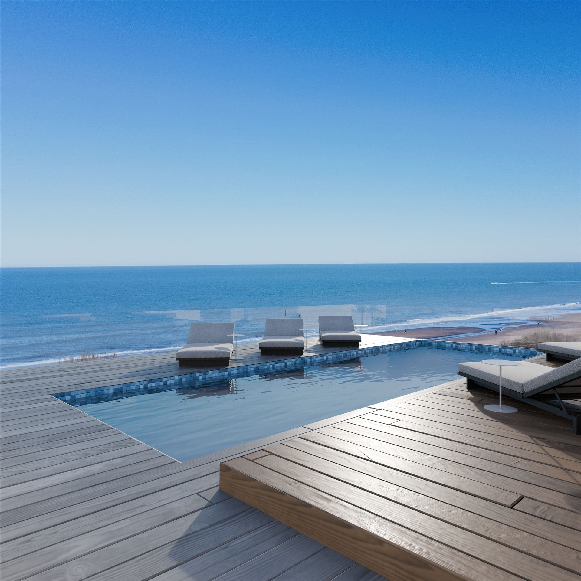 Piscina infinita en la terraza de Torre Faro II con vista al mar